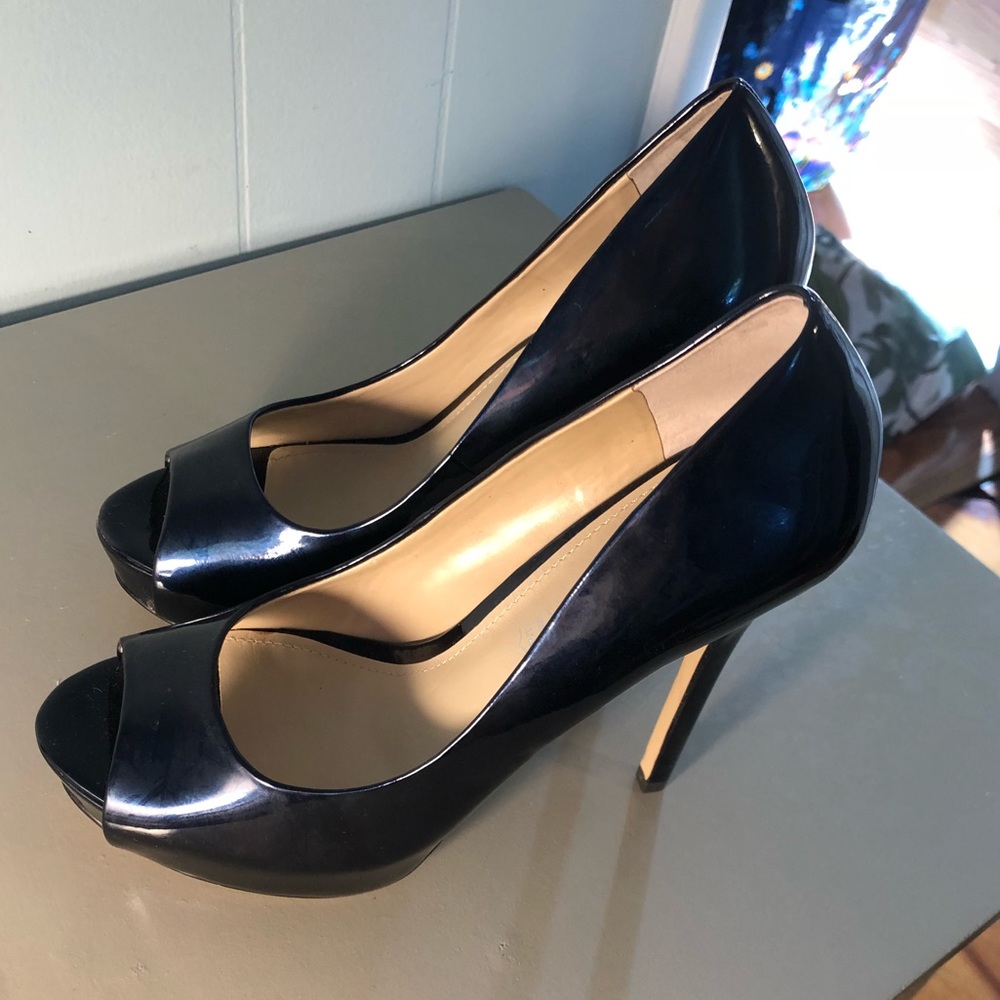 Brand new Aldo midnight blue peep toe high heels